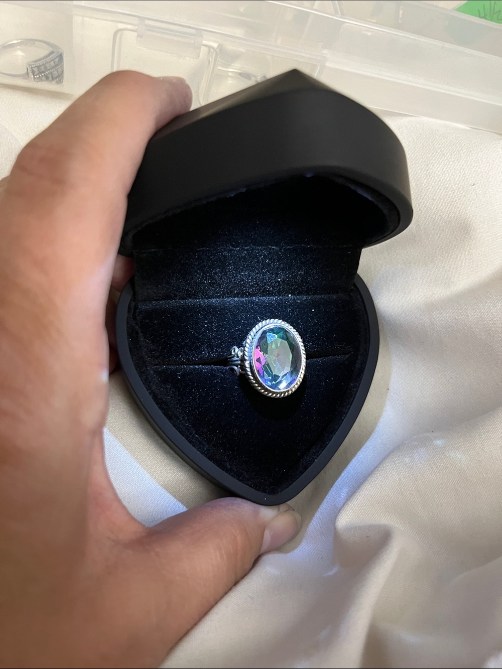 925 Sterling silver and mystic topaz ring.